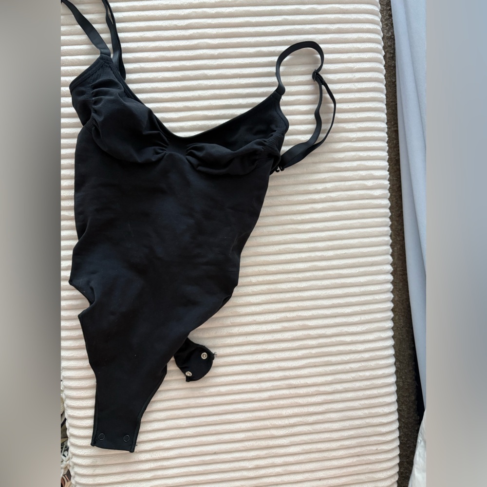 SKIMS Black shape wear bodysuit